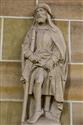 9315f41c-0719-4ac6-9600-c223b6465f35.jpg; 128; Heiligenfigur mit Pilgerhut und Stab ; Steinplastik